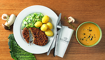 Der BIO-Veggie-Pilzburger mit Kohlgemüse von GOURMET Business À la Carte sorgt für klimafreundlichen Genuss mit bestem Geschmack.